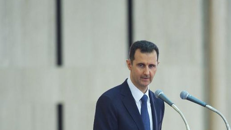 Photo fournie par l'agence Sana montrant le président syrien Bachar al-Assad, lors d'un discours à Damas le 4 août 2013