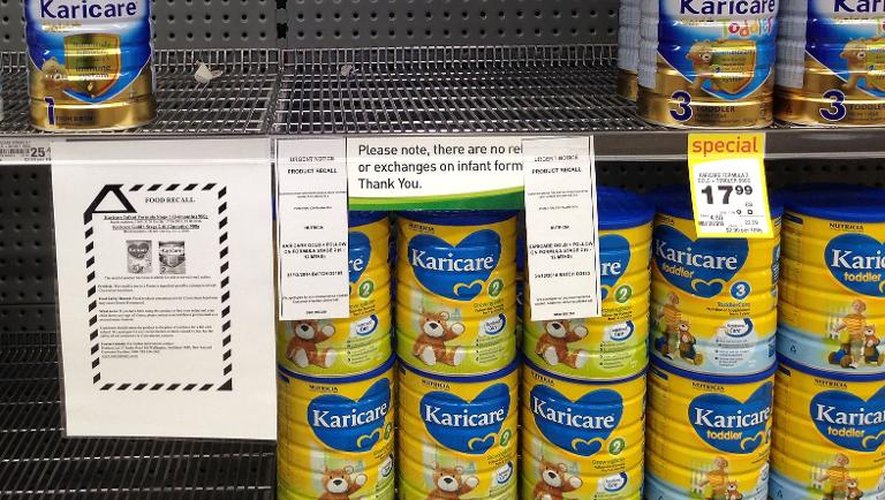 Des étagères vides au rayon lait en poudre dans un supermarché néo-zélandais, à Wellington, le 5 août 2013