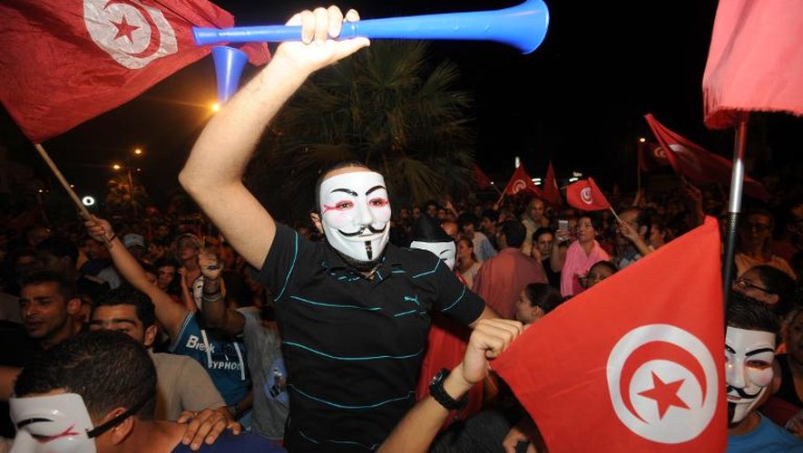 Des Tunisiens manifestent contre le gouvernement islamiste, le 4 août 2013 à Tunis