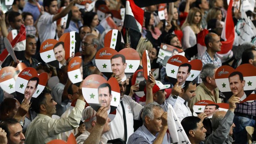 Rassemblement électoral pro-Assad à Damas, le 13 mai 2014 avant les élections présidentielles du mois de juin