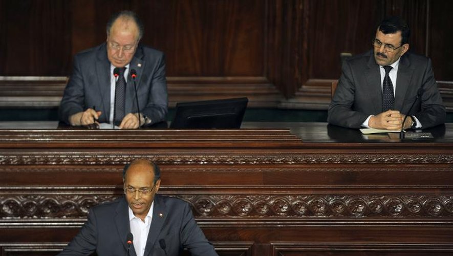 Le président tunisien Moncef Marzouki (en bas à g), le président de l'Assemblée nationale constituante Mustapha Ben Jaafar ( en haut à g) et le Premier ministre Ali Larayedh, le 25 juillet 2013 à Tunis