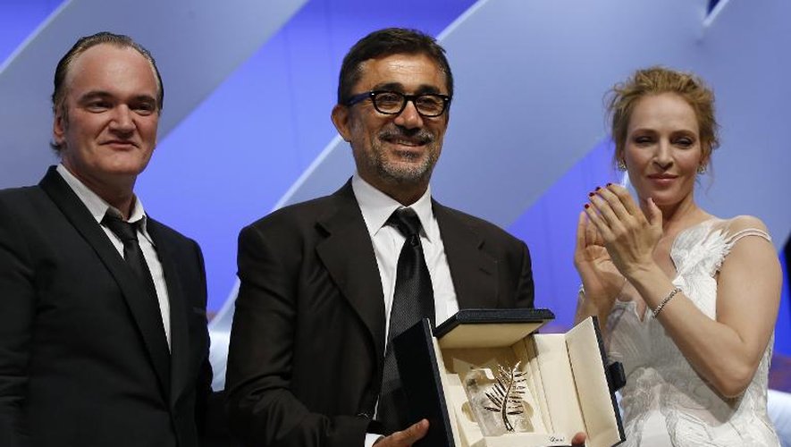 Le réalisateur turc Nuri Bilge Ceylan après avoir reçu la palme d'Or à Cannes, pour son film "Winter sleep" (sommeil d'hiver), le 24 mai 2014