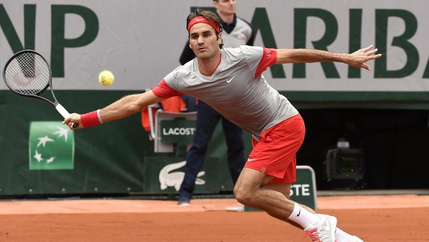 Le Suisse Roger Federer contre le Slovaque Lukas Lacko au premier tour de Roland-Garros, le 25 mai 2014 à Paris