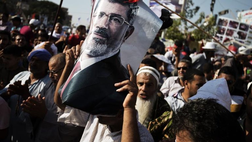 Des partisans du président islamiste destitué Mohamed Morsi manifestent au Caire le 10 août 2013