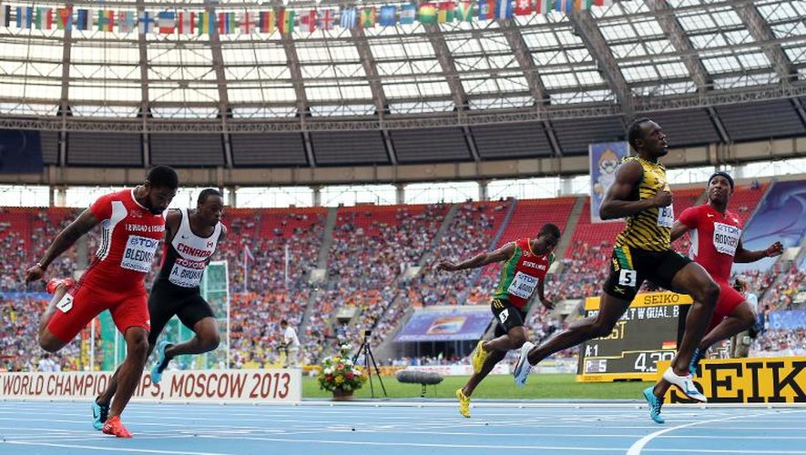 Usain Bolt (2 à partir de la droite) dans sa demi-finaloe du 100 des Mondiaux d'athlétisme le 11 août 2013 à Moscou