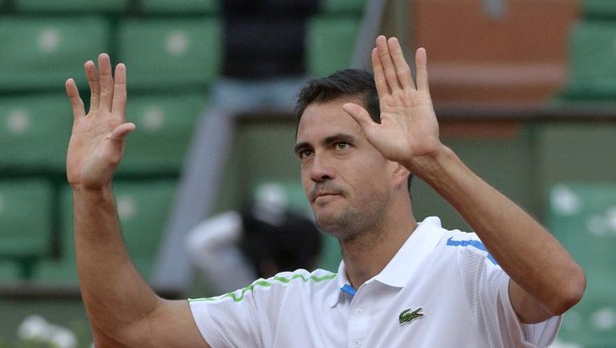L'Espagnol Guillermo Garcia-Lopez après sa victoire contre le Suisse Stanislas Wawrinka, le 26 mai 2014 à Roland-Garros