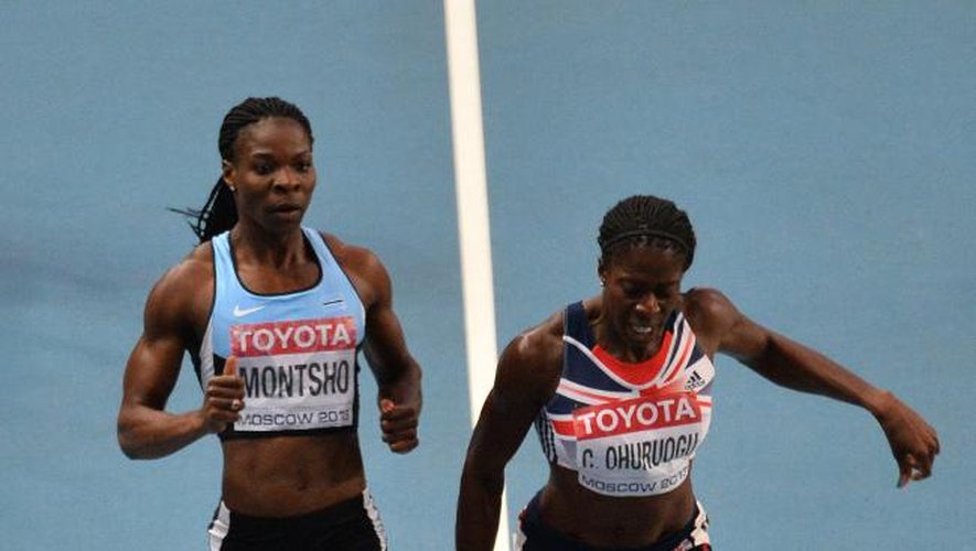 La Britannique Christine Ohuruogu (d) vient arracher sur la ligne le titre à la Bostwanaise Amantle Montsho sur 400 m aux Mondiaux d'athlétisme le 12 août 2013 à Moscou