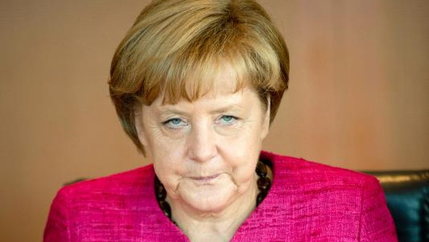 La Chancelière allemande Angela Merkel mène le Conseil des ministres, le 14 août 2013 à Berlin