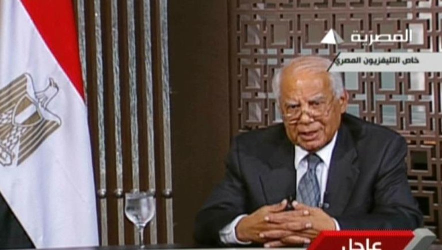 Le Premier ministre égyptien nommé par l'armée, Hazem Beblawi, s'adresse le 14 août 2013 à la nation, depuis la télévision égyptienne