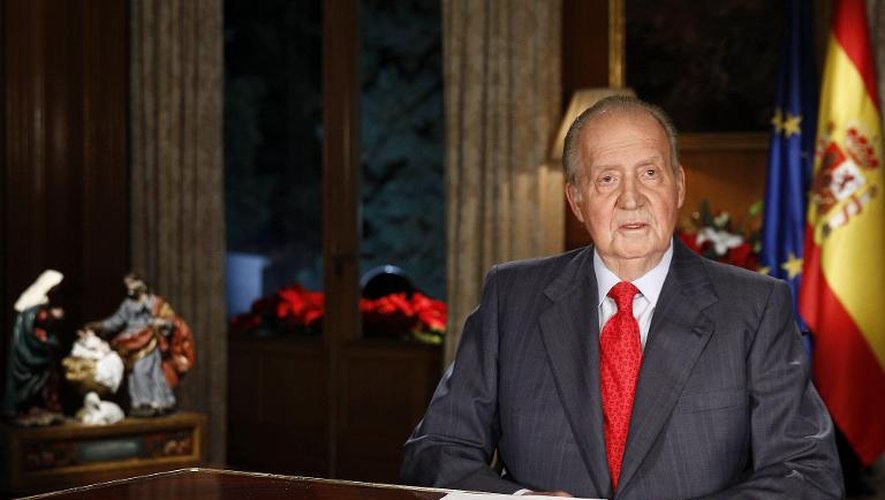 Le roi Juan Carlos le 24 décembre 2013 lors de la cérémonie de ses voeux à l'Espagne