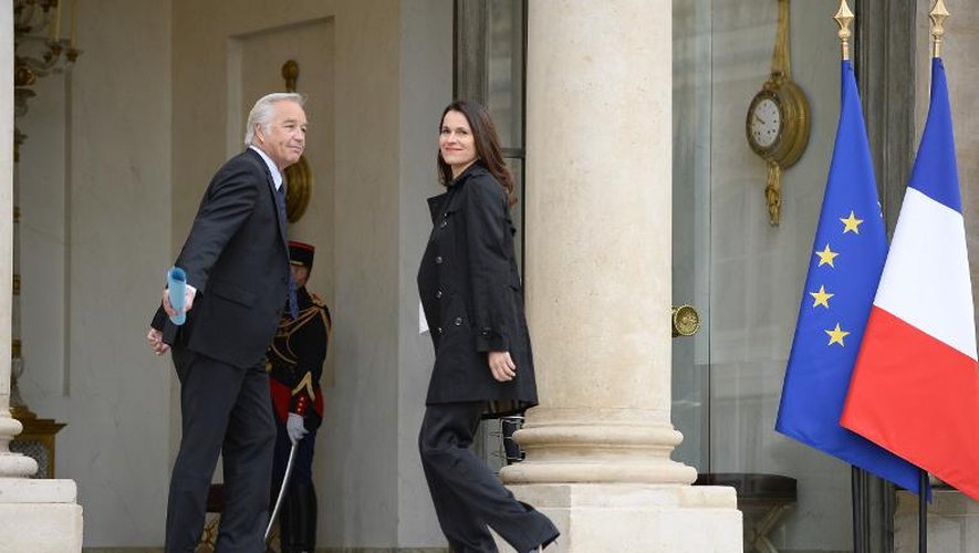 Le ministre français du Travail François Rebsamen et la ministre de la Culture Aurélie Filippetti à l'Elysée, à Paris, le 4 avril 2014