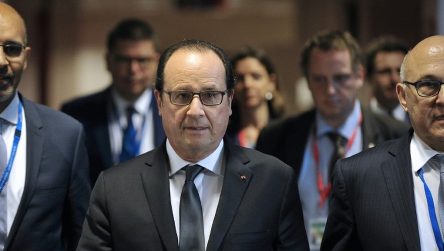 Le président François Hollande à son arrivée pour uen conférence de presse sur la Grèce le 13 juillet 2015 à Bruxelles