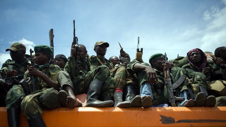 Des soldats rebelles du M23 se retirent de Goma, le 1er décembre 2012
