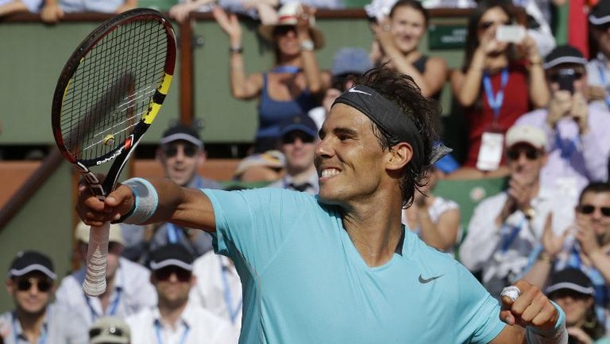 Le N. 1 mondial Rafael Nadal célèbre sa qualification pour la finale de Roland-Garros, après avoir éliminé en demi le Britannique Andy Murray, le 6 juin 2014 à Paris