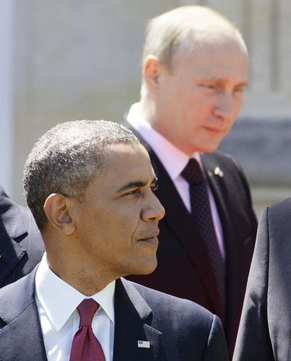 Barack Obama et Vladimir Poutine sur la photo de famille le 6 juin 2014 au chateau de Bénouville