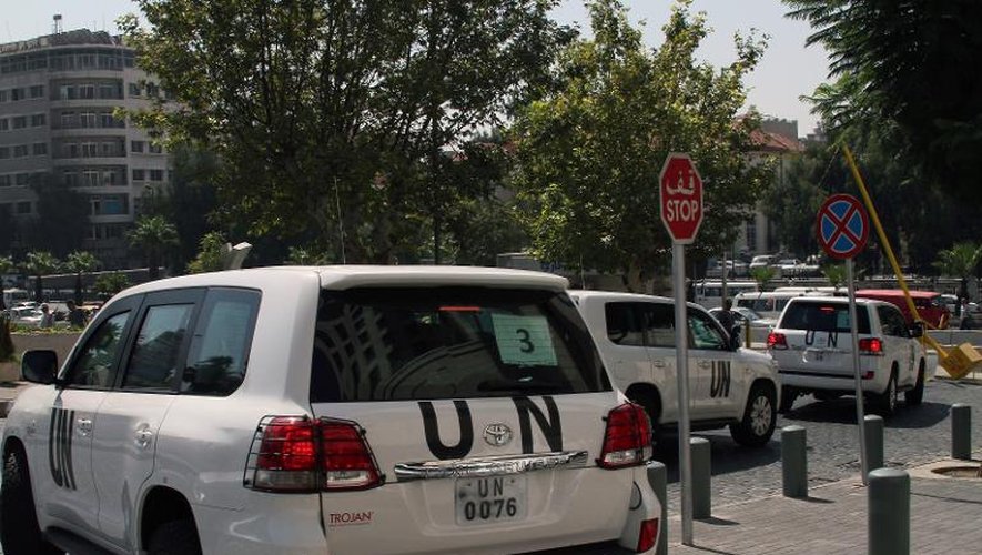 Le convoi des enquêteurs de l'Onu le 26 août 2013 à son départ de Damas