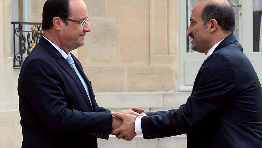 François Hollande reçoit le 24 juillet 2013 à Paris le leader de l'opposition syrienne, Ahmad Jarba (d)