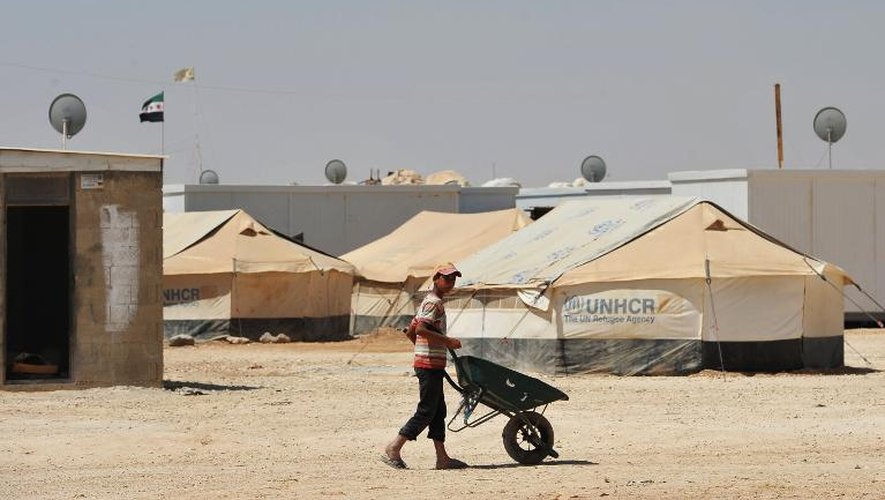 Un Syrien le 18 juillet 2013 dans le  camp de réfugiés de Zaatari près de la ville jordanienne de Mafraq à 8 km de la frontière avec la Syrie