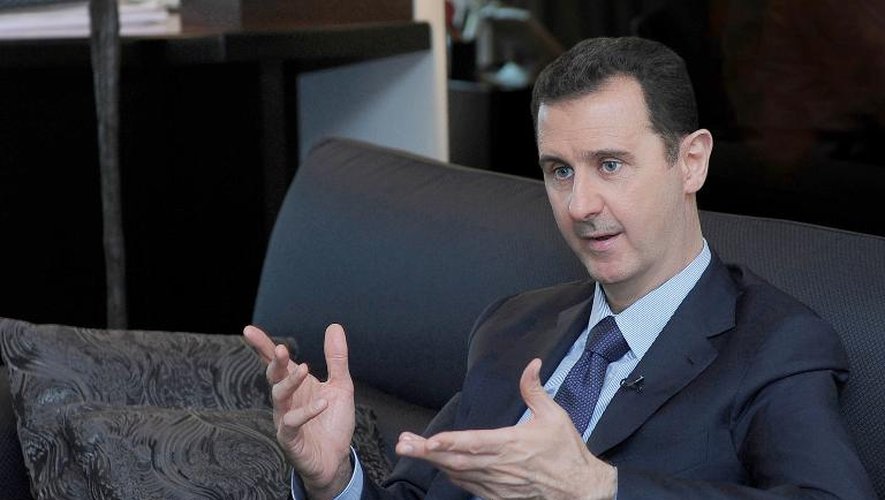 Image du président Bachar al-Assad à Dams fournie par l'agence officielle du régime, le 26 août 2013