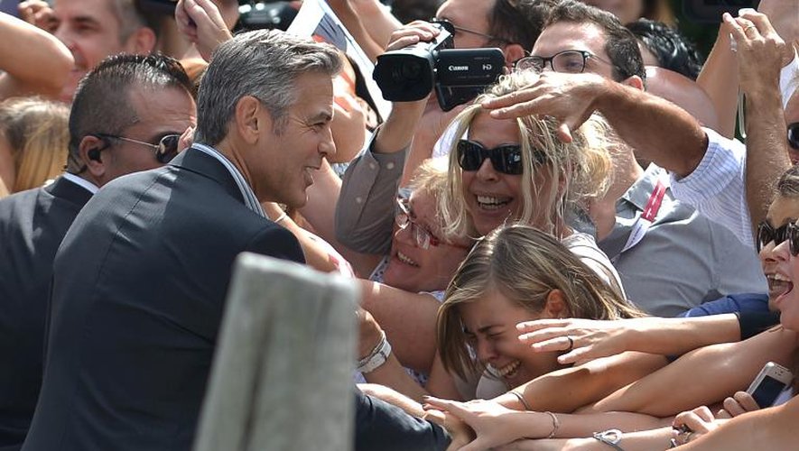 George Clooney arrive à la 70e Mostra de Venise, le 28 août 2013