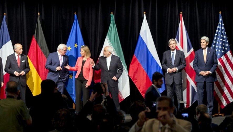 Les principaux diplomates qui ont oeuvré à la conclusion d'un accord sur le nucléaire iranien posent le 14 juillet 2015 à Vienne