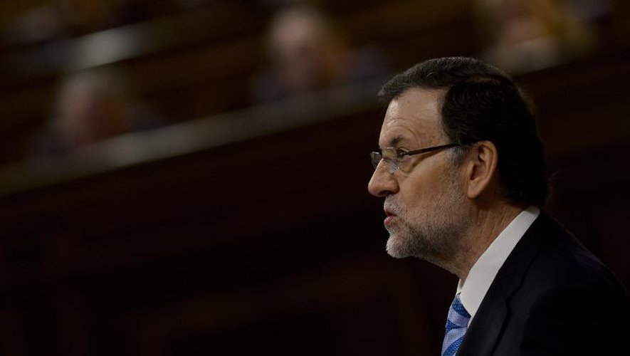 Le Premier ministre espagnol Mariano Rajoy parle le 11 juin 2014 à Madrid devant les députés, appelés à donner leur feu vert à l'abdication du roi Juan Carlos