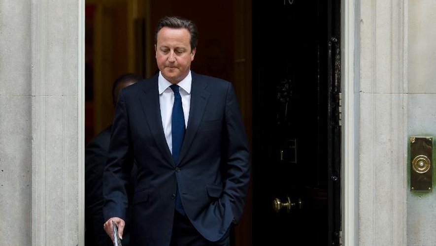 David Cameron à la sortie de Downing Street le 29 août 2013 à Londres