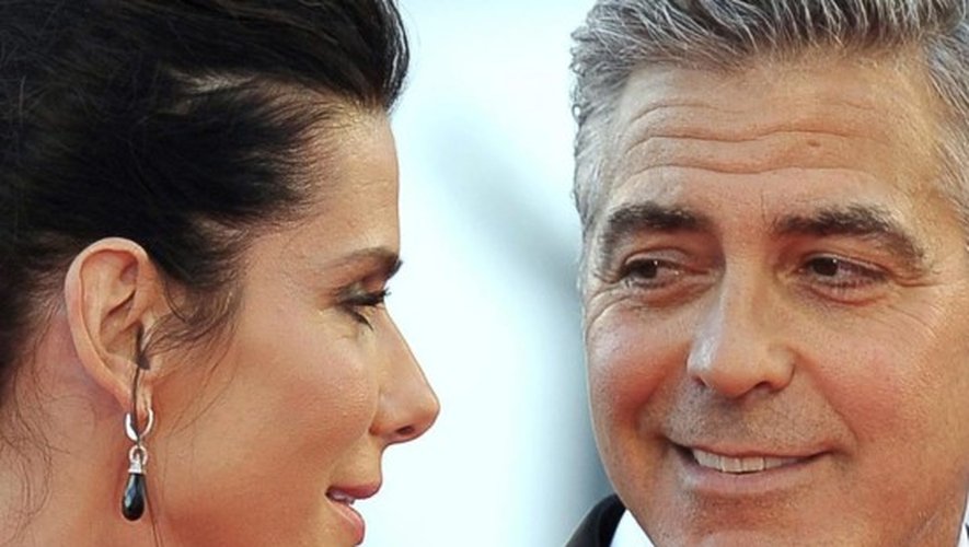 George Clooney célibataire, Sandra Bullock aussi... entre les deux acteurs le charme opère à la Mostra 2013