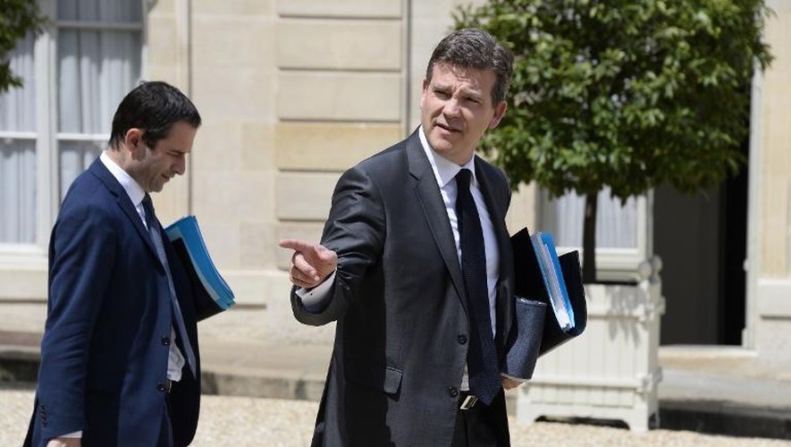 Le ministre de l'Economie Arnaud Montebourg (d) le 11 juin 2014