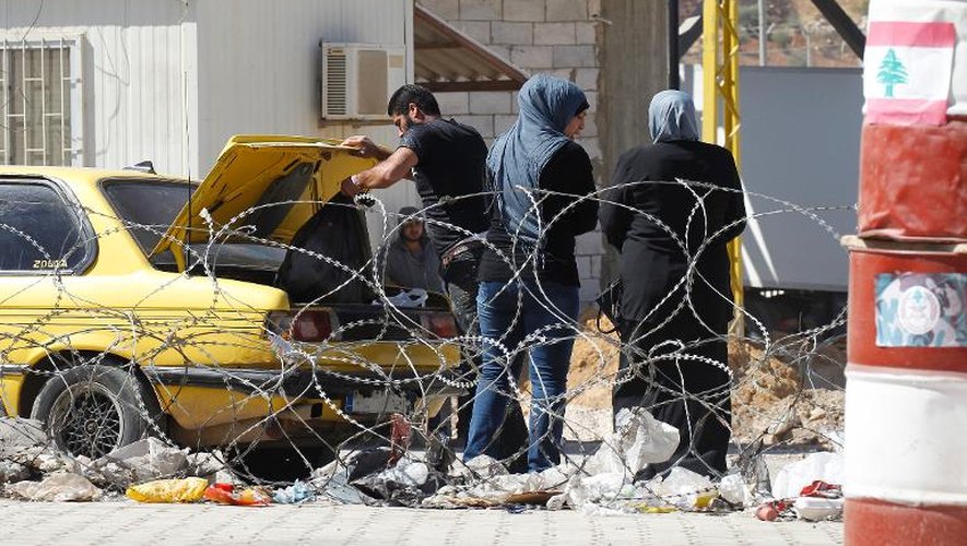Les voitures de familles syriennes contrôlées le 31 août 2013 au poste frontière de Masnaa