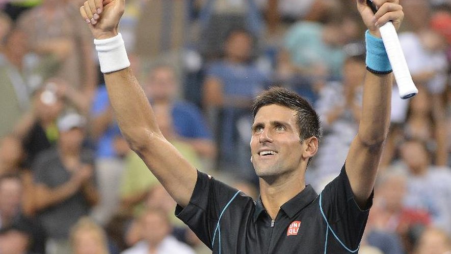 Le Serbe Novak Djokovic célèbre sa victoire face au Portugais Joao Sousa, à l'US Open, le 1er septembre 2013 à New York