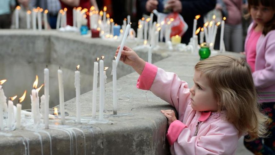 Cérémonie à Lviv à la mémoire des 49 victimes de l'avion de transport de troupes abattu par des insurgés prorusses à Lougansk, le 14 juin 2014
