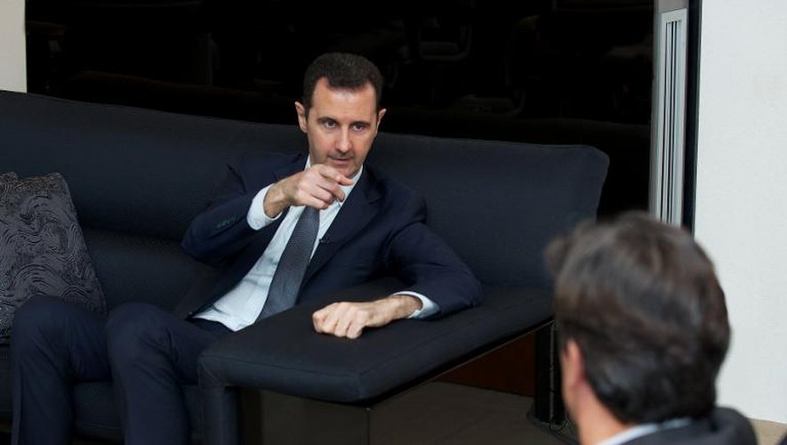 Bachar al-Assad s'entretient avec le journaliste français Georges Malbrunot, le 2 septembre 2013 à Damas