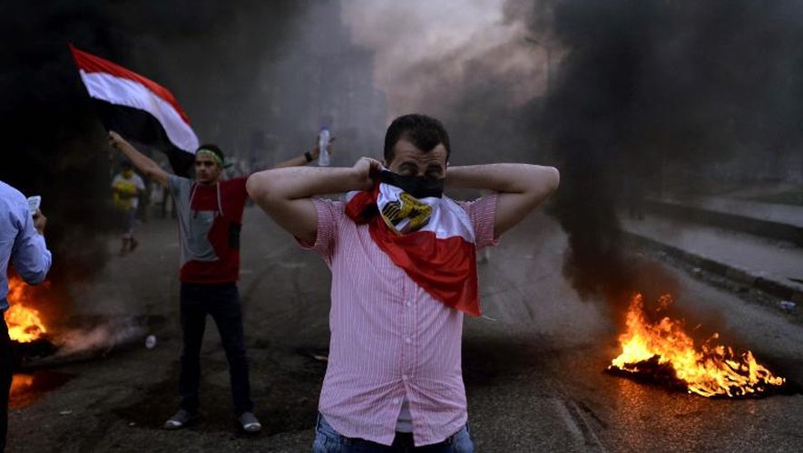 Des affrontements entre les partisans des Frères musulmans et de Mohamed Morsi et les forces de sécurité au Caire, le 30 août 2013