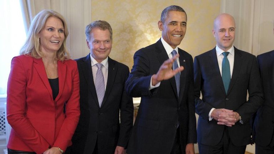Barack Obama entre (de Gà D) Helle Thorning-Schmidt, Sauli Niinisto et Fredrik Reinfeldt le 4 septembre 2013 à Stockholm