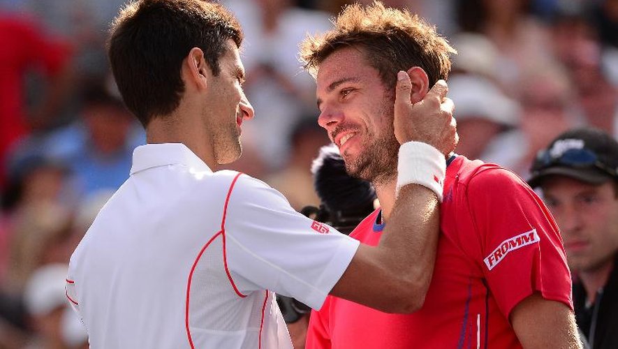Novak Djokovic et Stanislas Wawrinka après la demi-finale de l'US Open le 7 septembre 2013 à New York