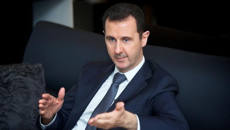 Photo fournie par la présidence syrienne de l'interview de Bachar al-Assad par le journaliste du Figaro Georges Malbrunot, le 2 septembre 2013 à Paris