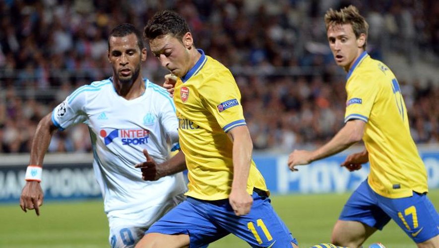 Mesut Ozil, d'Arsenal, à l'attaque contre Marseille en Ligue des champions le 18 septembre 2013 à Marseille