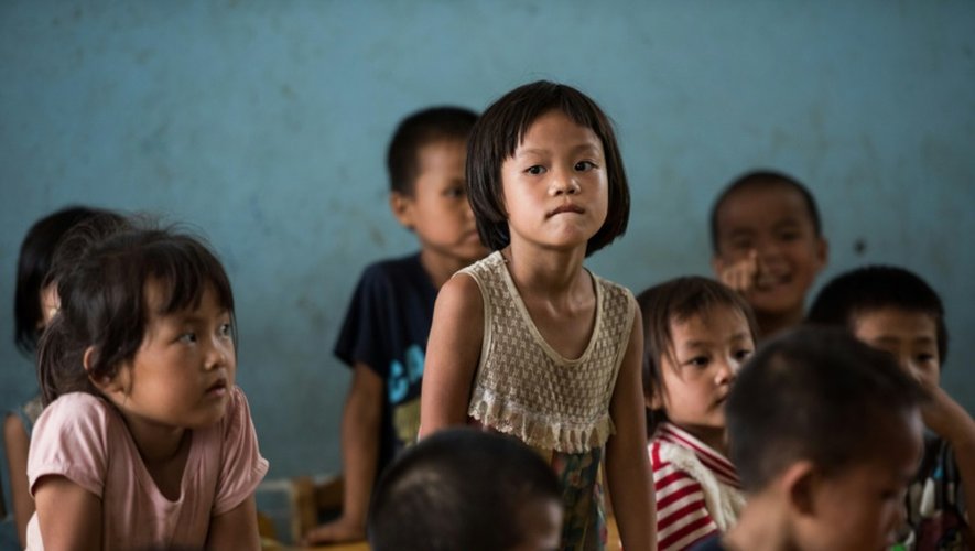 Des élèves d'une école primaire de Longfu Township, dans la région autonome de Guangxi en Chine, le 19 juin 2015