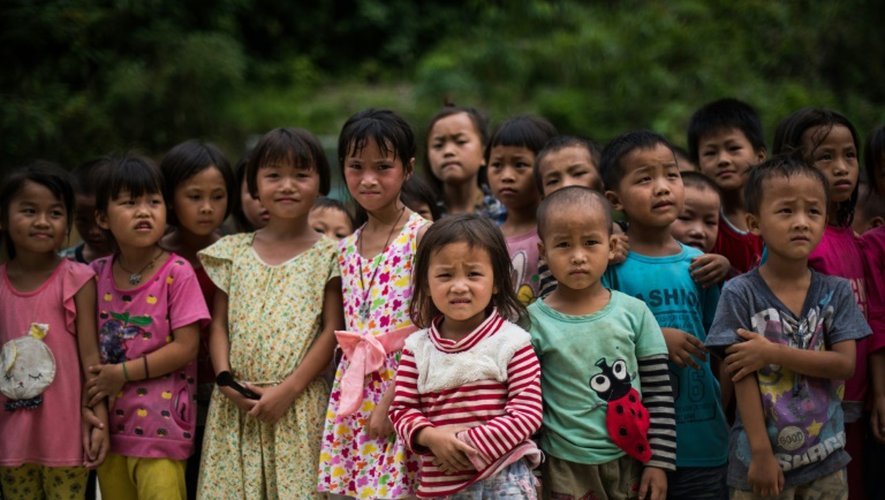 Des enfants de l'école primaire de Longfu Township, dans la région du Guangxi en Chine, le 19 juin 2015