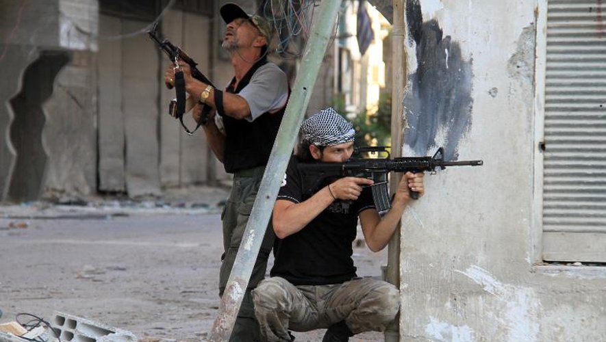 Des rebelles syriens, le 18 septembre 2013 dans un quartier de Damas