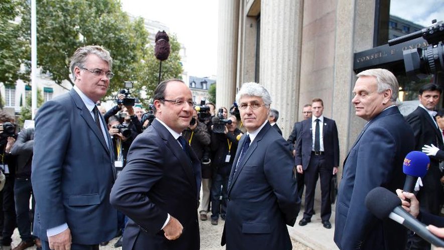 Le président François Hollande arrive pour la Conférence environnementale au Conseil économique, social et environnemental (Cese), le 20 septembre 2013 à Paris