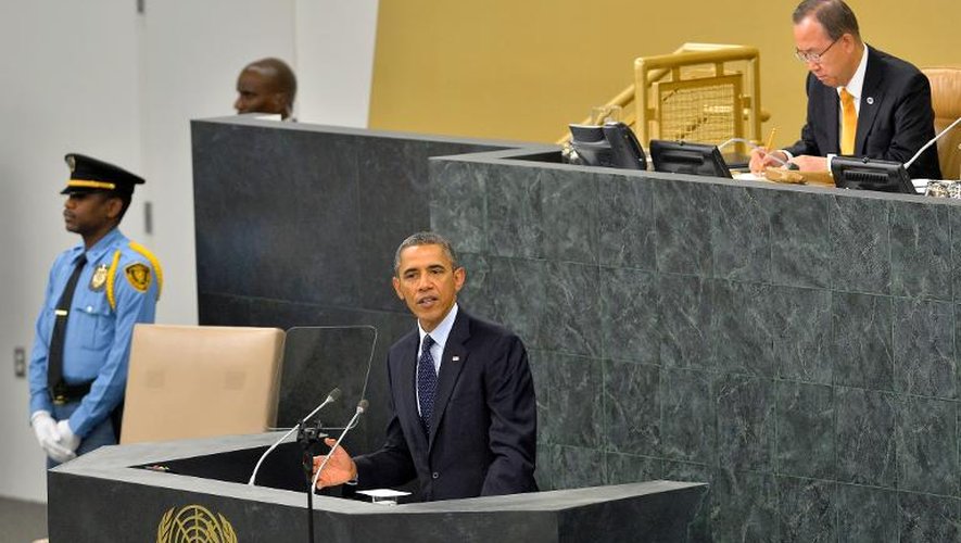 Barack Obama (c) et le secrétaire général de l'ONU Ban Ki-moon (d) à New York, le 24 septembre 2013