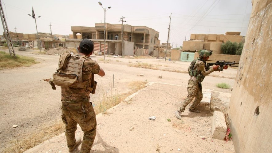 Les forces gouvernementales irakiennes patrouillent à Fallouja, le 19 juin 2016