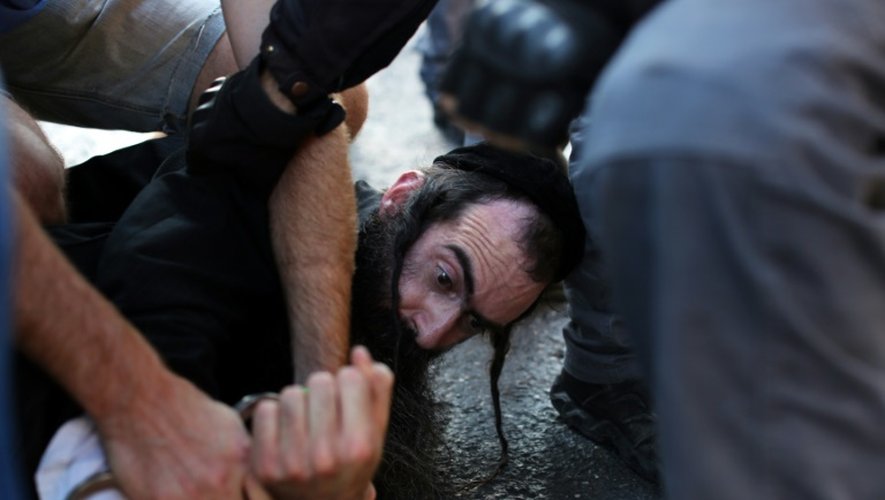 L'assaillant, Yishaï Shlissel, un juif ultra-orthodoxe, lors de son arrestation le 30 juillet 2015 à Jérusalem