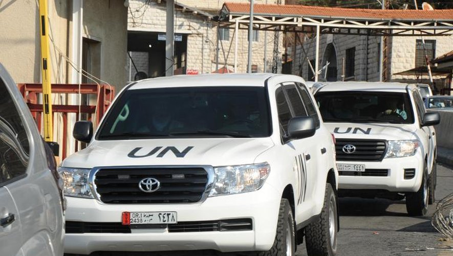 Des véhicules des experts en armes chimiques de l'ONU, le 30 septembre 2013 à Damas