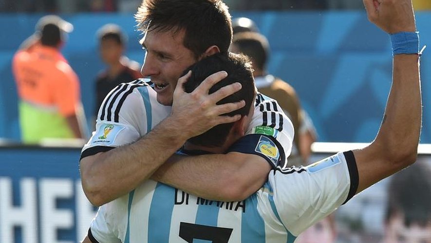 La joie des Argentins Lionel Messi et Angel Di Maria, auteurs du but de la victoire face à la Suisse, le 1er juillet 2014 à Sao Paulo
