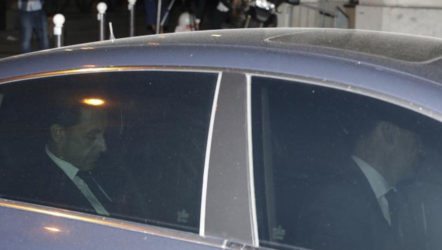 Nicolas Sarkozy quitte le pôle financier du TGI de Paris, le 2 juillet 2014