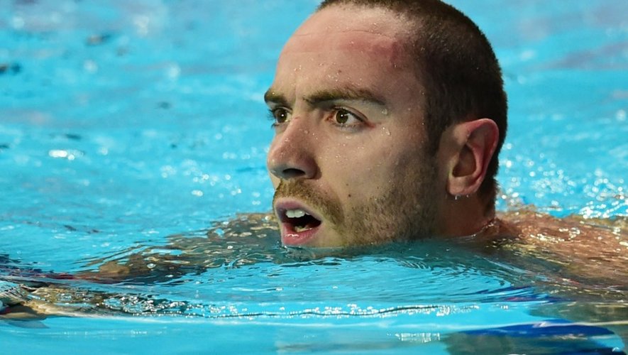 Jérémy Stravius attend l'annonce de son chrono en demi-finale du 100 m libre aux Mondiaux de natation à Kazan, le 5 août 2015