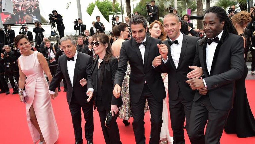 L'équipe du film "Qu'est-ce qu'on a fait au Bon Dieu" au Festival de Cannes, le 22 mai 2014